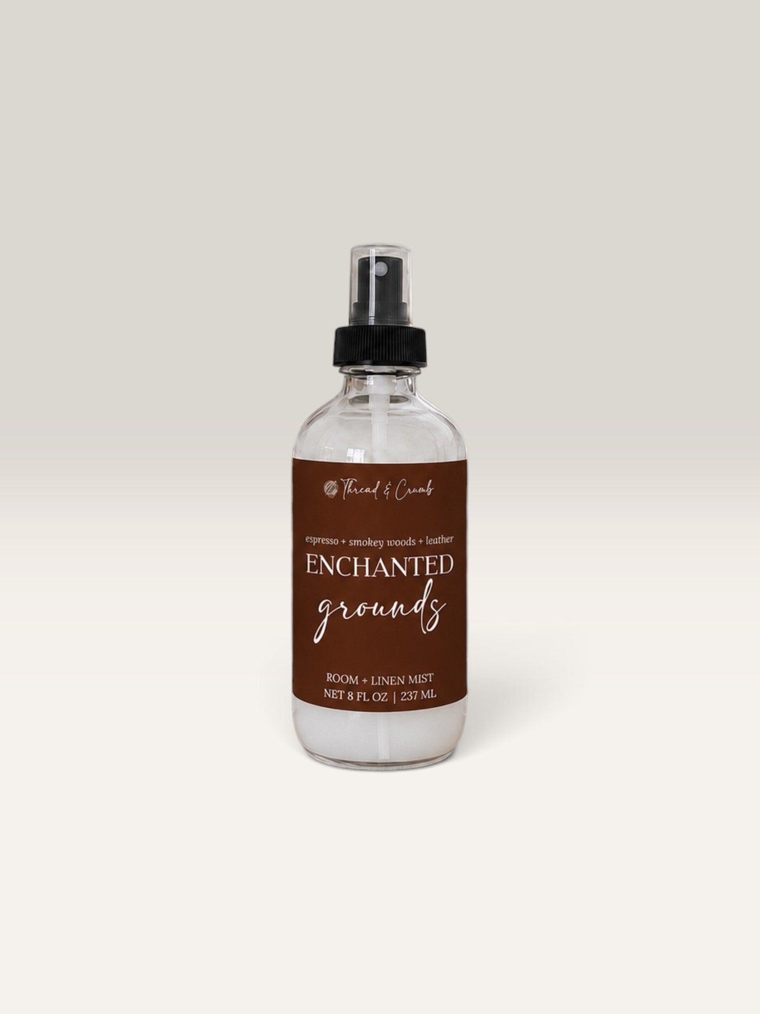 Enchanted Grounds fall room and linen spray with espresso, smoky woods and leather fragrance notes