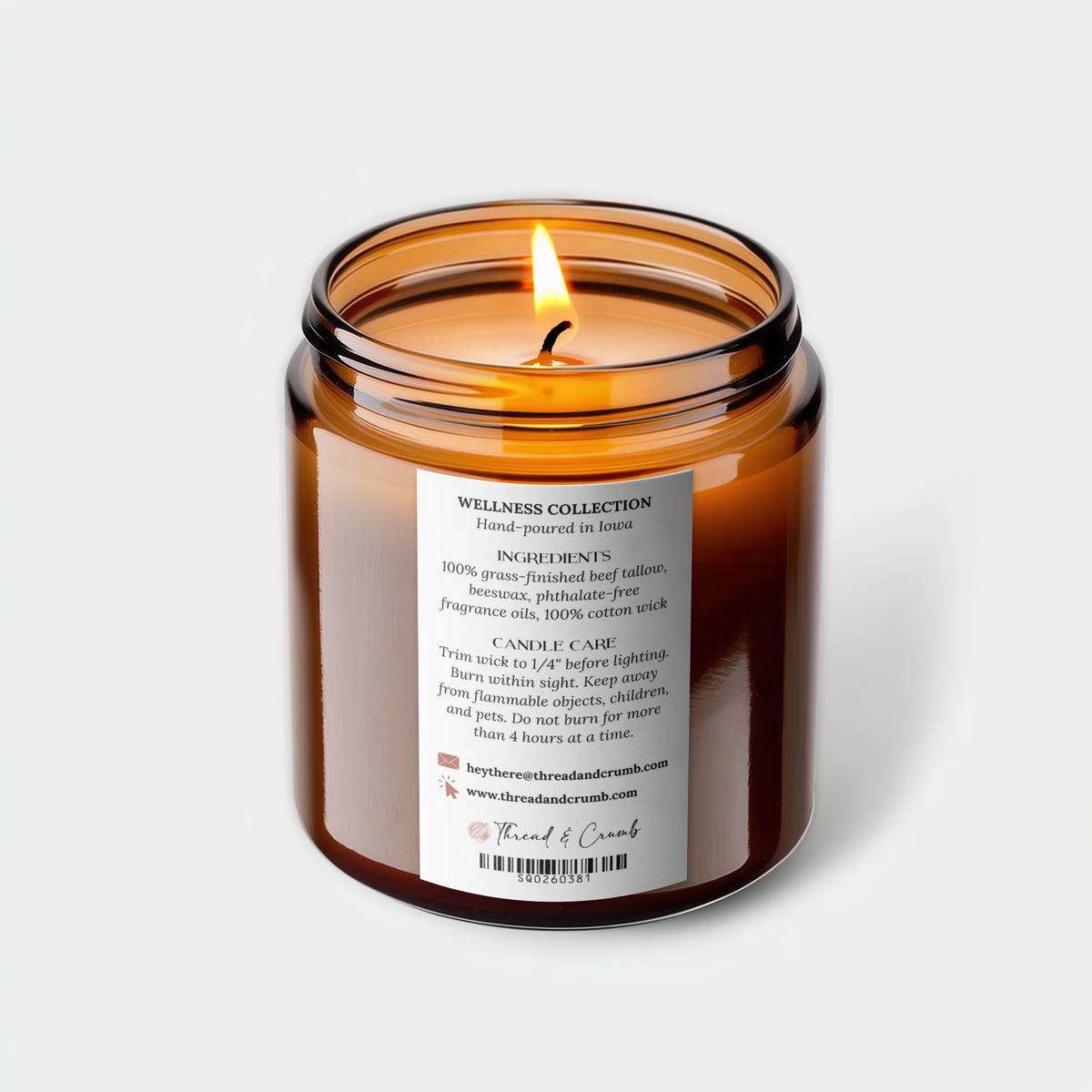 Back of Wellness Collection candle showing product information and candle care instructions