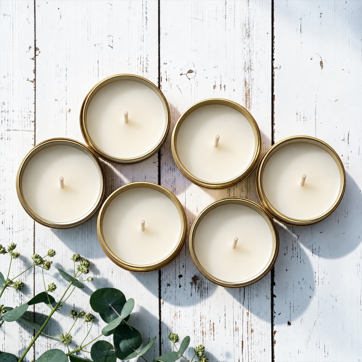 Six mini beeswax and tallow candles in the Wellness Collection candle sampler